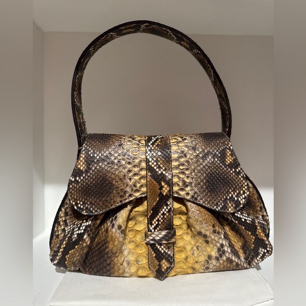 Adriana Castro MERCEDES genuine python handbag Gabriel Garcia Marquez wife name